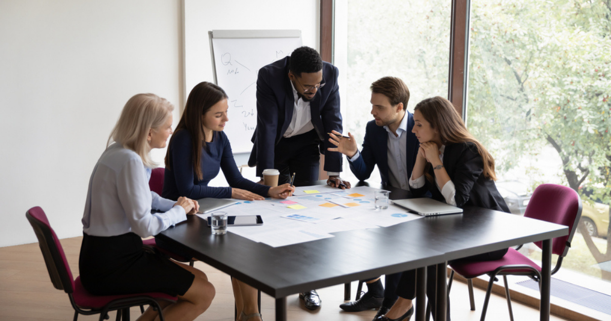 Business team analyzing how to sell across multiple sales channels and stay tax compliant